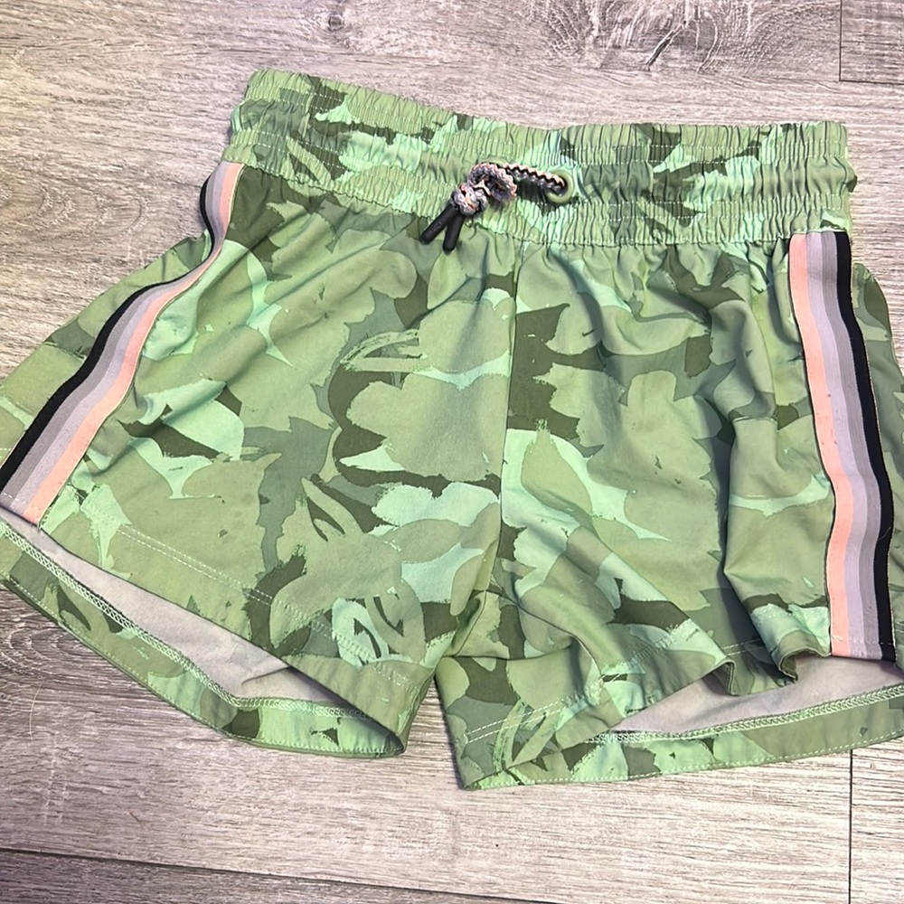 Green athletic shorts